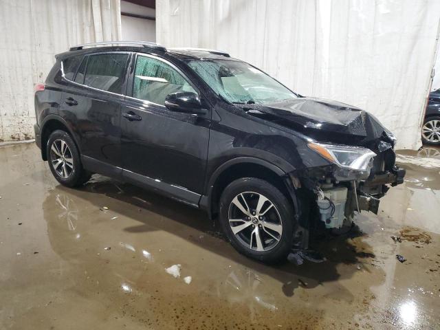 Photo 4 from auction – 2017 TOYOTA RAV4 XLE with VIN 2T3RFREV7HW644696