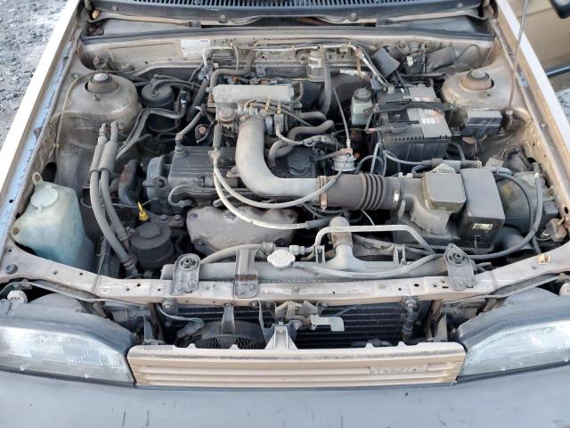 Photo 11 from auction – 1989 MAZDA 323 with VIN JM1BF2223K0367740