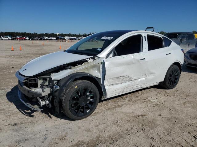 TESLA MODEL Y 2023 with VIN 7SAYGDEE4PA071028 - Photo from auction