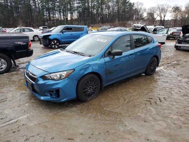 SUBARU IMPREZA 2018 with VIN 4S3GTAA65J3749388 - Photo from auction