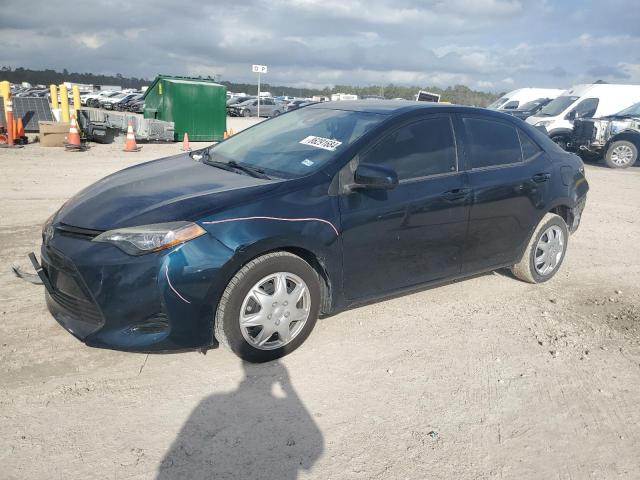 TOYOTA COROLLA L 2017 with VIN 5YFBURHE3HP677305 - Photo from auction