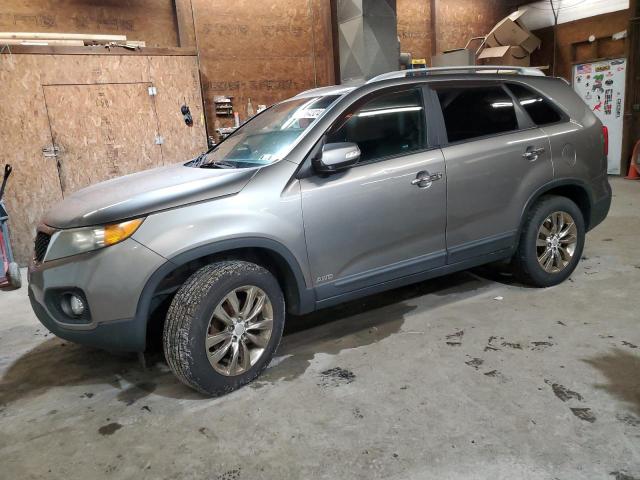 KIA SORENTO EX 2011 with VIN 5XYKUDA1XBG069450 - Photo from auction