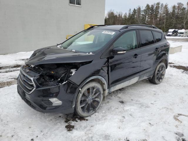 FORD ESCAPE TIT 2017 with VIN 1FMCU0J93HUD70583 - Photo from auction