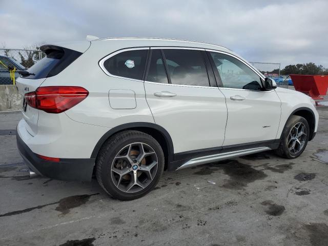Photo 3 from auction – 2016 BMW X1 XDRIVE2 with VIN WBXHT3C35G5F64442