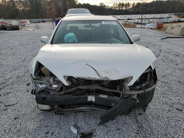 Photo 5 from auction – 2003 TOYOTA CAMRY LE with VIN 4T1BE32K93U126523