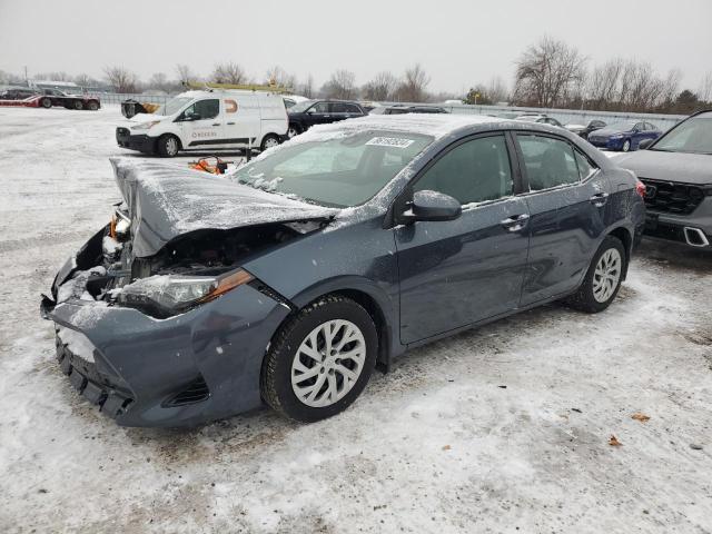 TOYOTA COROLLA L 2018 with VIN 2T1BURHE7JC080390 - Photo from auction