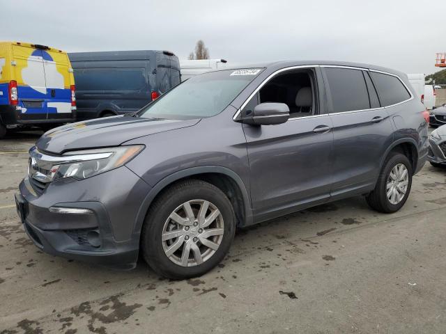 HONDA PILOT LX 2020 with VIN 5FNYF6H17LB027252 - Photo from auction