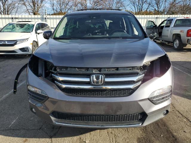 Photo 5 from auction – 2017 HONDA PILOT ELIT with VIN 5FNYF6H03HB039655