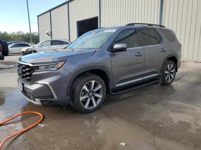 HONDA PILOT ELIT 2025 with VIN 5FNYG1H84SB047079 - Photo from auction