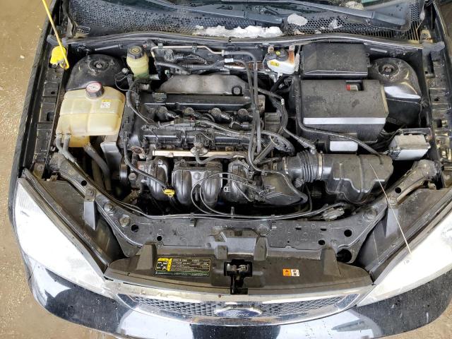 Photo 11 from auction – 2005 FORD FOCUS ZX3 with VIN 3FAFP31N55R124604