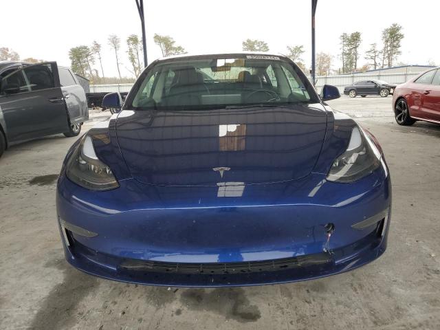 Photo 5 from auction – 2022 TESLA MODEL 3 with VIN 5YJ3E1EA9NF331772