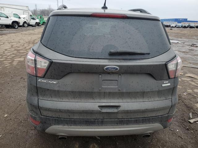 Photo 6 from auction – 2018 FORD ESCAPE SE with VIN 1FMCU0GD6JUA50675