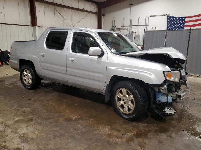 Photo 4 from auction – 2010 HONDA RIDGELINE with VIN 5FPYK1F40AB009126