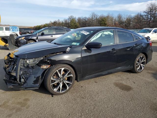 HONDA CIVIC 2018 with VIN 2HGFC1E52JH709393 - Photo from auction