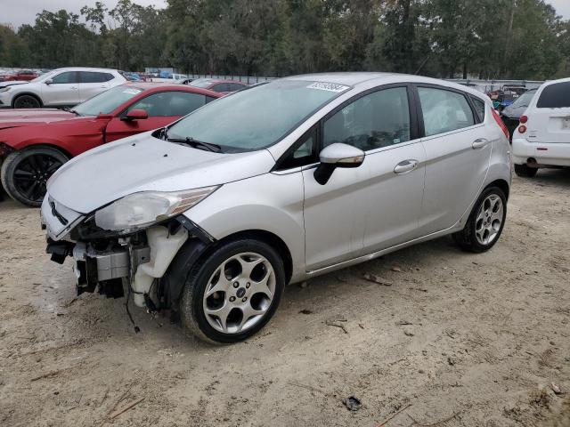 FORD FIESTA SES 2011 with VIN 3FADP4FJ3BM129084 - Photo from auction