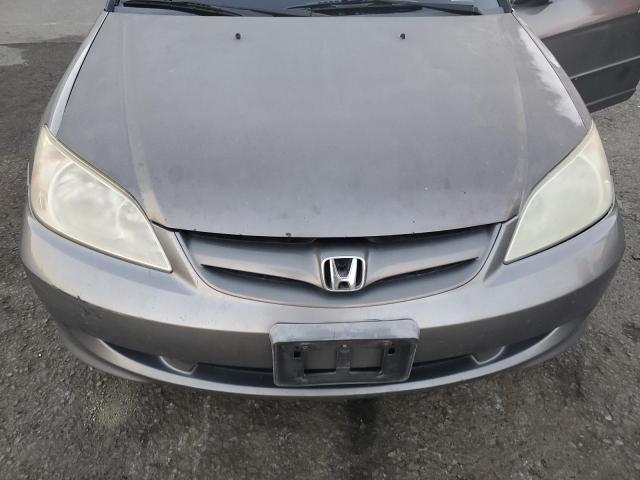 Photo 11 from auction – 2005 HONDA CIVIC LX with VIN 2HGES15565H532030