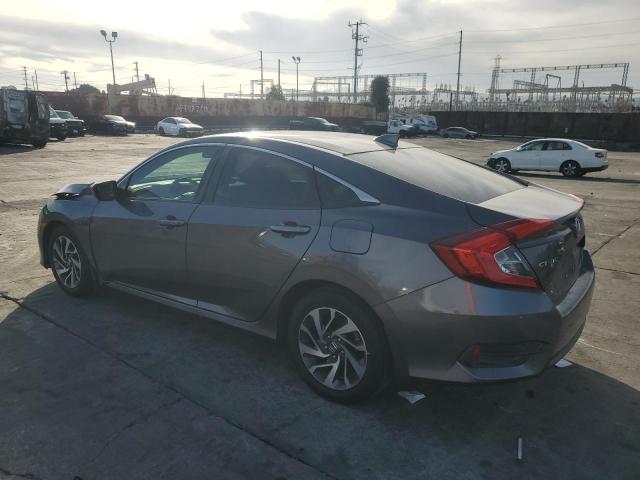 Photo 2 from auction – 2017 HONDA CIVIC EX with VIN 2HGFC2F72HH514653