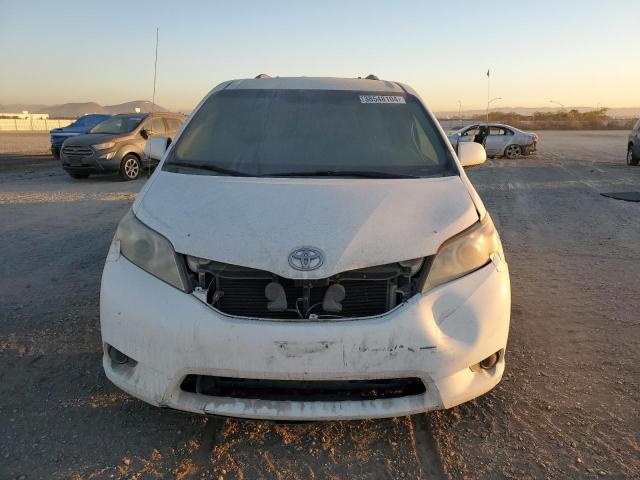 Photo 5 from auction – 2014 TOYOTA SIENNA LE with VIN 5TDKK3DC3ES431204