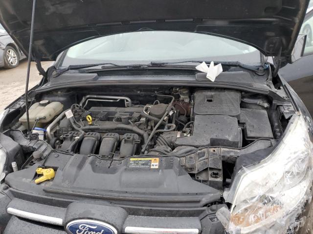 Photo 11 from auction – 2012 FORD FOCUS SE with VIN 1FAHP3F22CL118844
