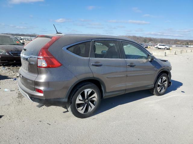 Photo 3 from auction – 2016 HONDA CR-V TOURI with VIN 5J6RM4H98GL131752