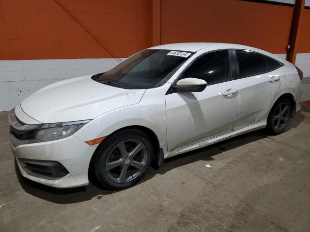 HONDA CIVIC LX 2018 with VIN 2HGFC2F55JH025071 - Photo from auction