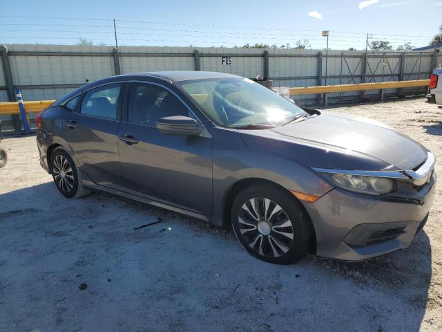 Photo 4 from auction – 2016 HONDA CIVIC LX with VIN 19XFC2F50GE038054