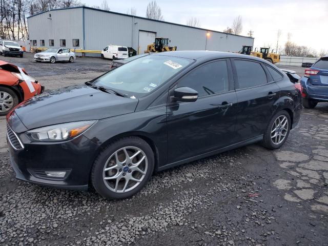 FORD FOCUS SE 2015 with VIN 1FADP3F27FL201141 - Photo from auction