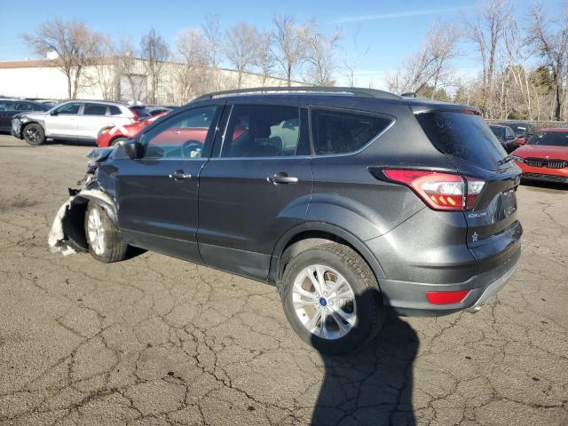 Photo 2 from auction – 2018 FORD ESCAPE SE with VIN 1FMCU9GD9JUA86610