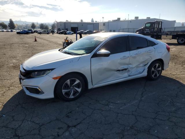 HONDA CIVIC LX 2019 with VIN 19XFC2F64KE201855 - Photo from auction