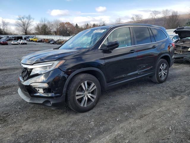HONDA PILOT EXLN 2017 with VIN 5FNYF6H79HB069739 - Photo from auction