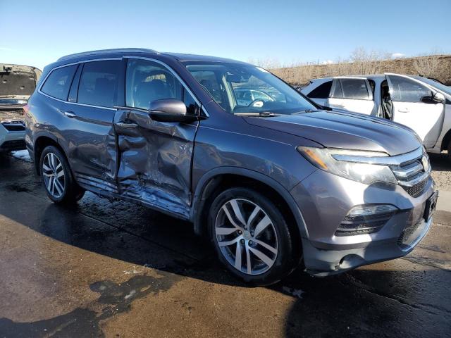 Photo 4 from auction – 2016 HONDA PILOT ELIT with VIN 5FNYF6H02GB109693