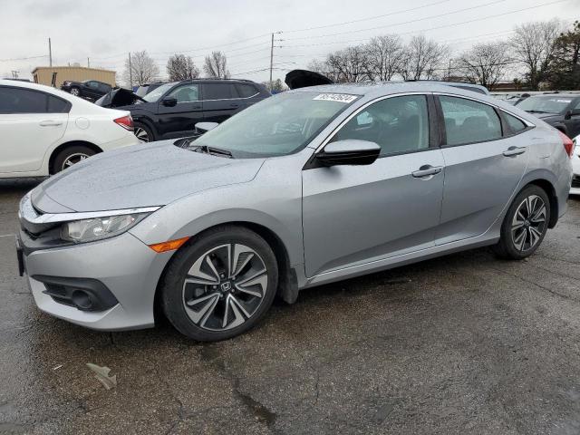 Photo 1 from auction – 2016 HONDA CIVIC EX with VIN 19XFC1F33GE016073