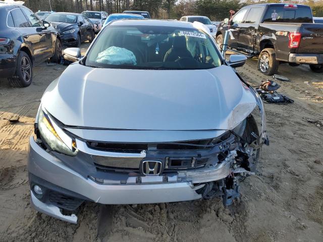 Photo 5 from auction – 2016 HONDA CIVIC 4D E with VIN 19XFC1F91GE219807