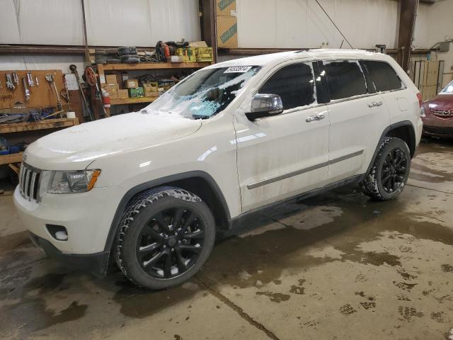 JEEP GRAND CHER 2011 with VIN 1J4RR5GG9BC654374 - Photo from auction