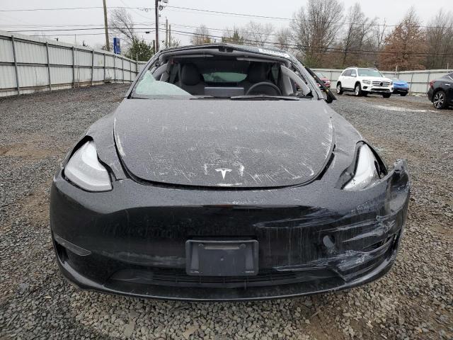Photo 5 from auction – 2023 TESLA MODEL Y with VIN 7SAYGDEE8PA044544
