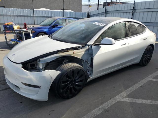 TESLA MODEL 3 2021 with VIN 5YJ3E1EA5MF090694 - Photo from auction