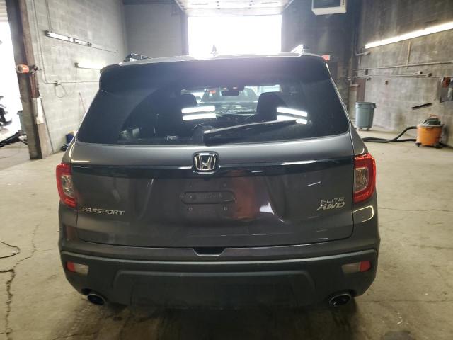 Photo 6 from auction – 2021 HONDA PASSPORT E with VIN 5FNYF8H05MB011443