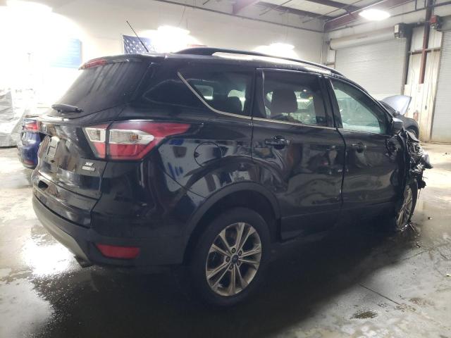 Photo 3 from auction – 2017 FORD ESCAPE SE with VIN 1FMCU9GD5HUD85599