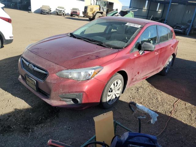 SUBARU IMPREZA 2018 with VIN 4S3GTAA68J3701450 - Photo from auction
