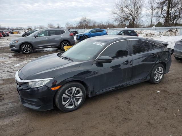 HONDA CIVIC LX 2018 with VIN 2HGFC2F5XJH011361 - Photo from auction