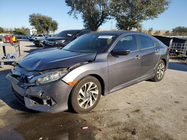 HONDA CIVIC EX 2016 with VIN 19XFC2F7XGE033946 - Photo from auction