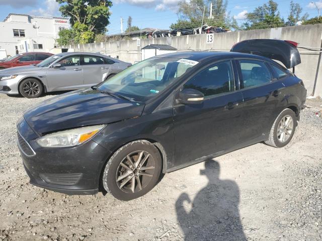 FORD FOCUS SE 2015 with VIN 1FADP3F26FL205682 - Photo from auction