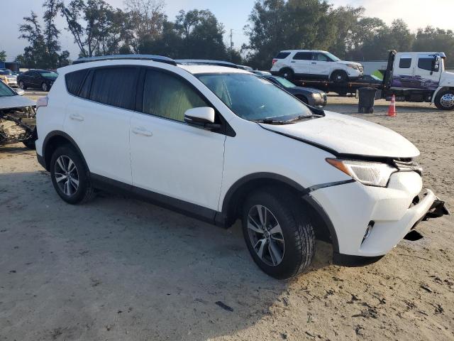 Photo 4 from auction – 2016 TOYOTA RAV4 XLE with VIN JTMWFREV8GJ075082