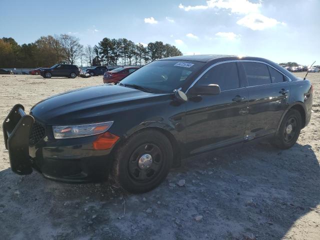 FORD TAURUS POL 2014 with VIN 1FAHP2L80EG105329 - Photo from auction