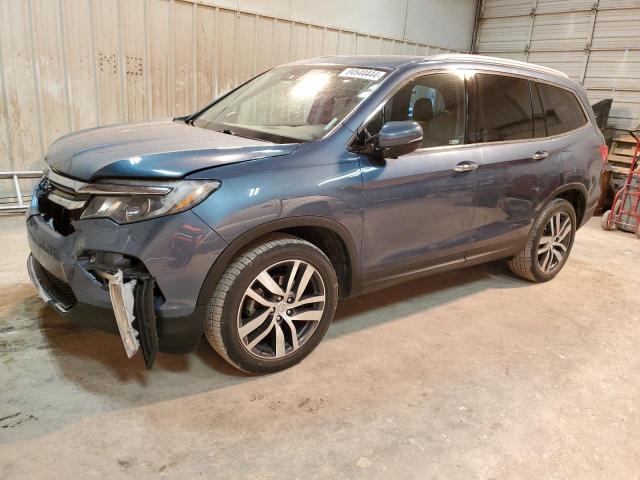 HONDA PILOT ELIT 2018 with VIN 5FNYF6H00JB032636 - Photo from auction