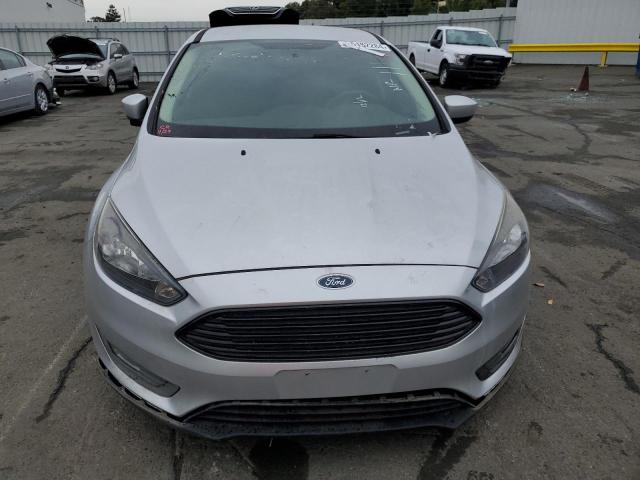 Photo 5 from auction – 2018 FORD FOCUS SE with VIN 1FADP3FE1JL271320