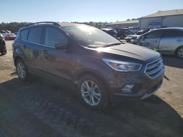 Photo 4 from auction – 2018 FORD ESCAPE SE with VIN 1FMCU0GD4JUC62961