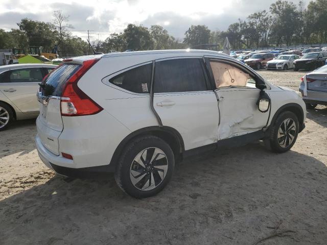 Photo 3 from auction – 2016 HONDA CR-V TOURI with VIN 5J6RM3H99GL004390