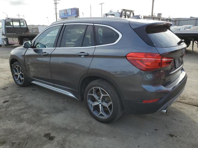 Photo 2 from auction – 2018 BMW X1 XDRIVE2 with VIN WBXHT3Z38J4A66353