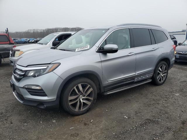 HONDA PILOT ELIT 2017 with VIN 5FNYF6H00HB015412 - Photo from auction
